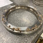 Four point contact ball bearing. Outer race and spacer. Ready for inspection