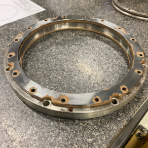 Four point contact ball bearing. Outer race and spacer. Ready for inspection